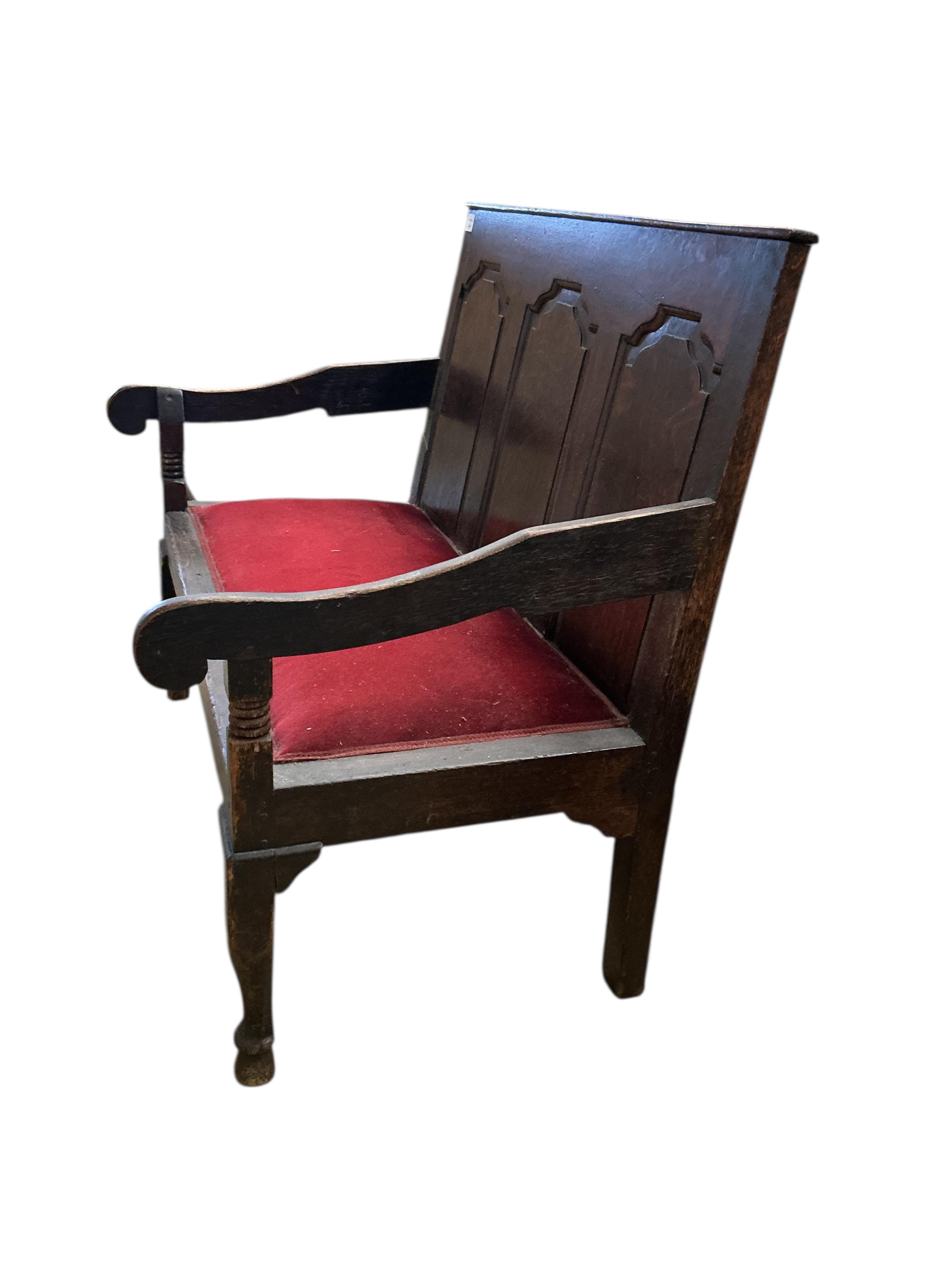 A small George III panelled oak settle, width 112cm, depth 65cm, height 99cm